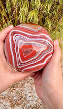 Load image into Gallery viewer, Huge sardonyx sphere statement piece with incredible banding!
